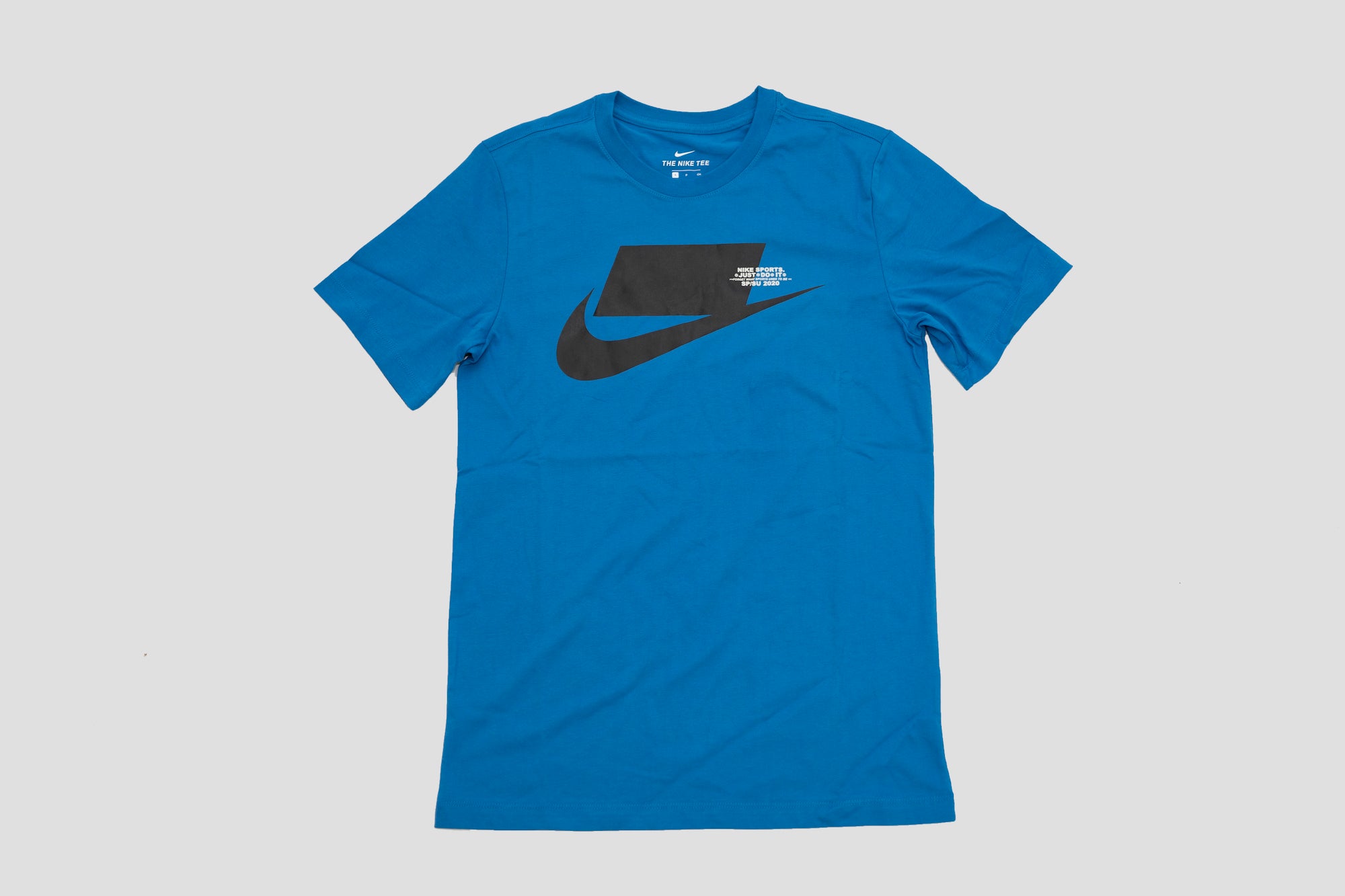 https://www.solefly.com/cdn/shop/products/Blue_Nike_Shirt_New_2000x.jpg?v=1583348848